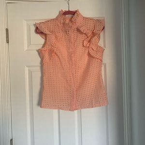 Pink ruffled blouse